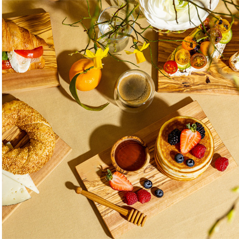 tunisian olive wood products on a breakfast board