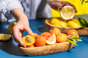 olive wood fruit tray with apricots