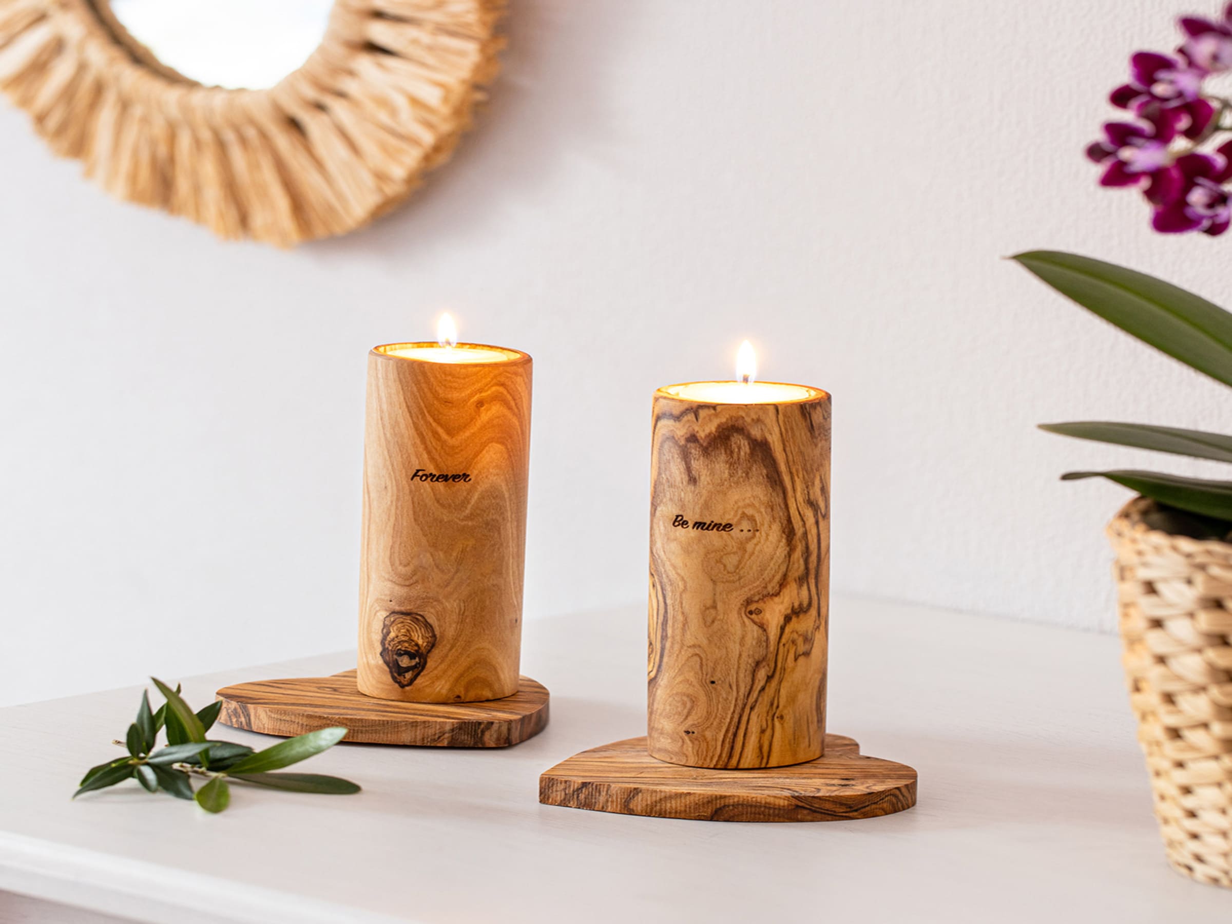 Two Olive wood candle holders on olive wood rustic coasters